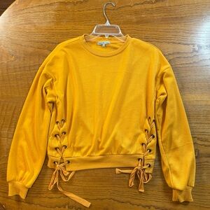Charlotte Russe Yellow Crew Neck Sweater with Lace-Up Accents